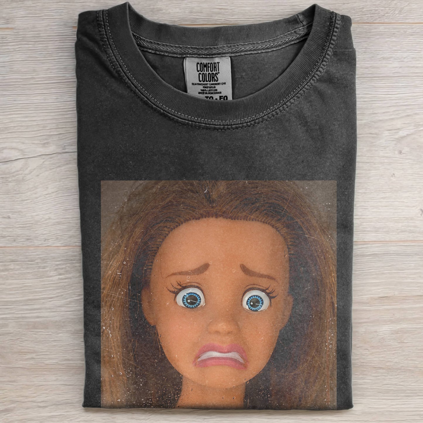 DOLL FACE MEME SHOCKED TEE