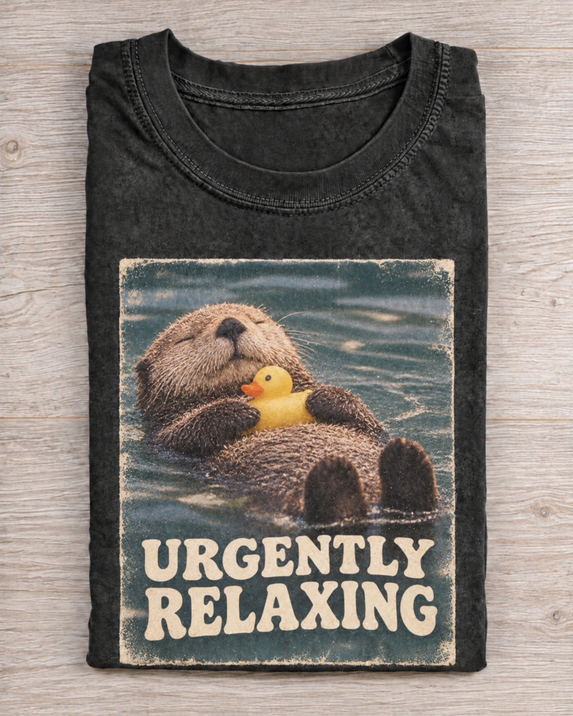 Black Washed Otter Urgently Relaxing Graphic Tee