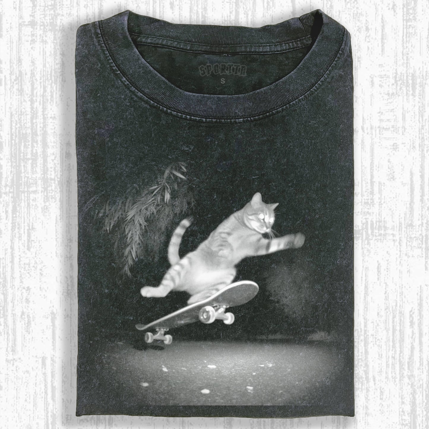 WACKY CAT TEE. 7.5