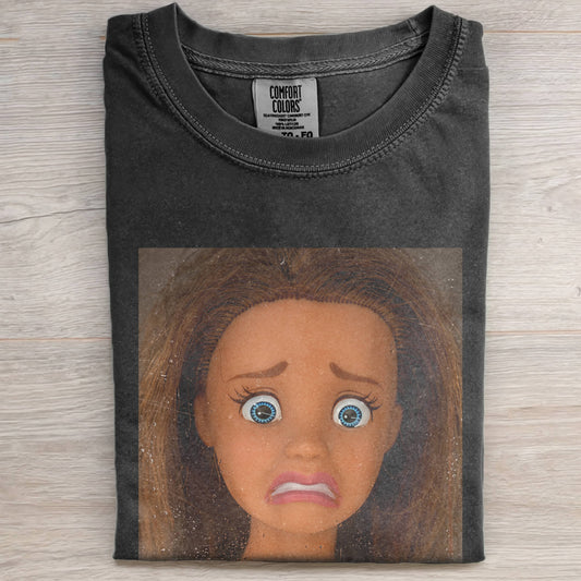 DOLL FACE MEME SHOCKED TEE