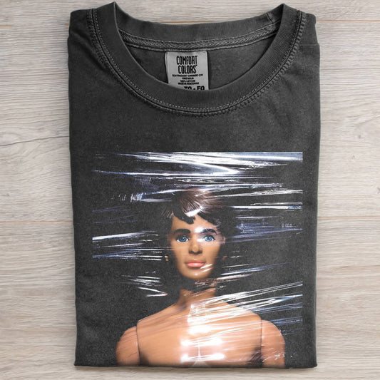 PLASTIC FILM DOLL FACE MEME TEE