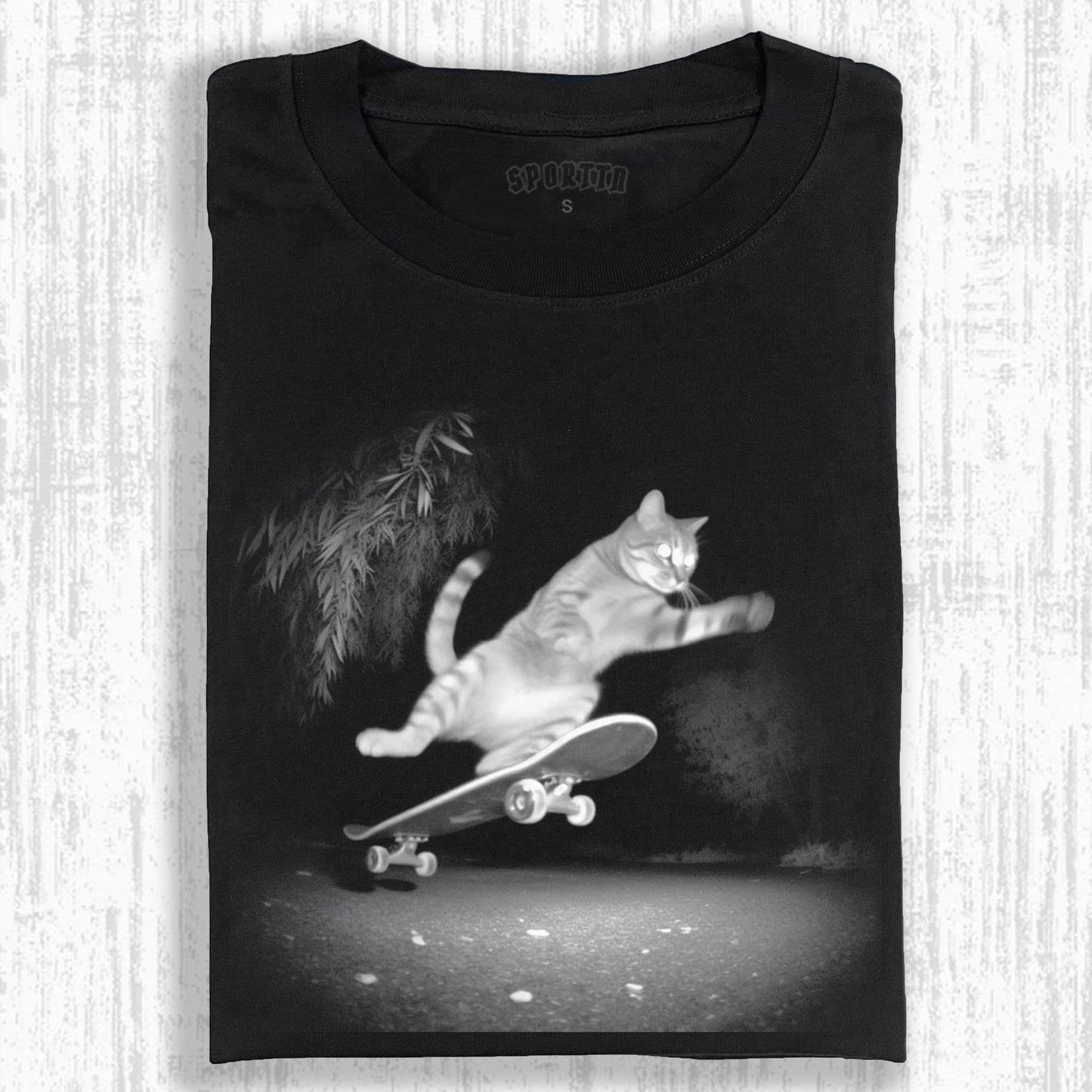 WACKY CAT TEE. 7.5