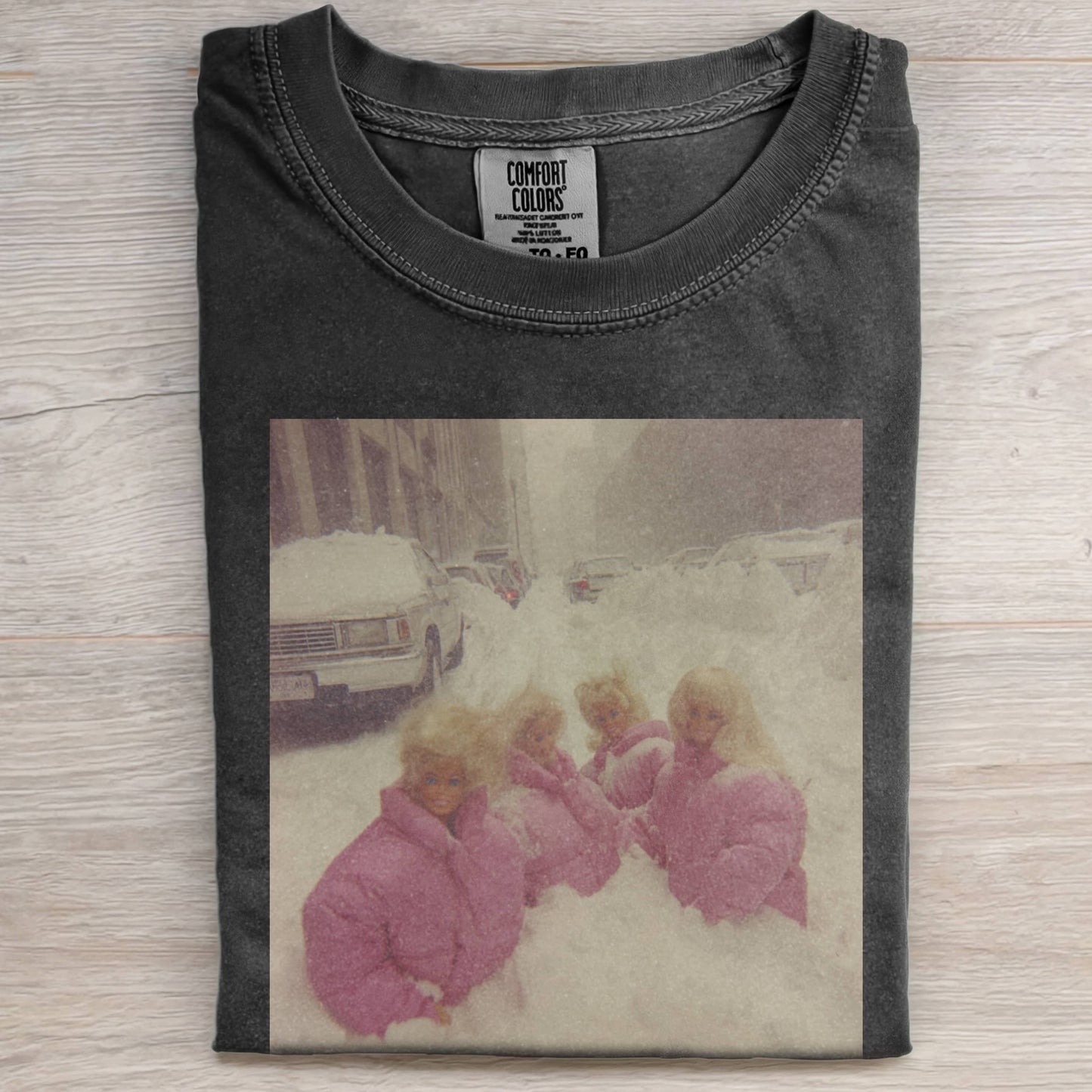 FOUR PEOPLE WEARING PINK BARBIECORE  ARE SQUATTING IN THE SNOW TEE